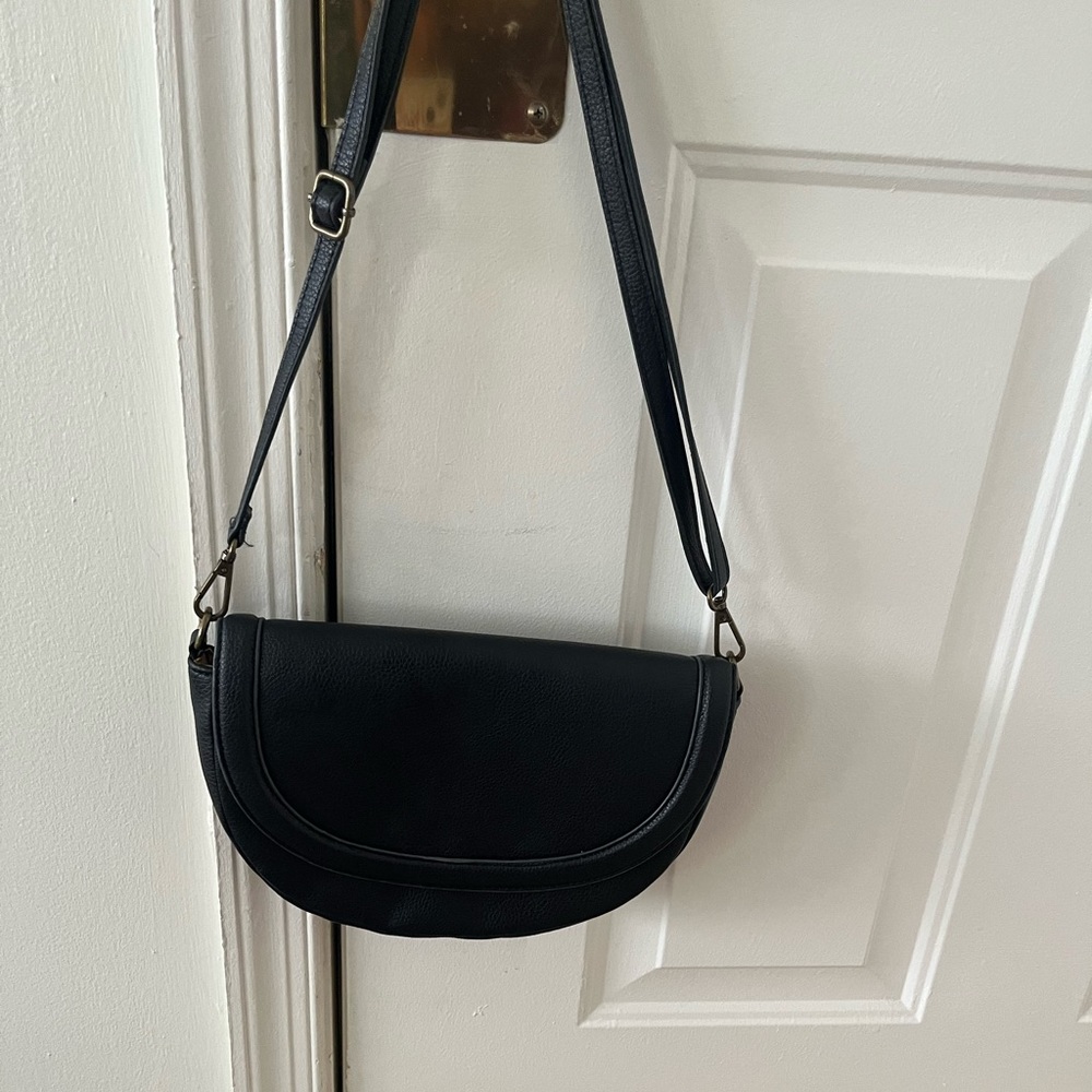 DSW Black Crescent shape handbag. Like new! Golden yellow color lining inside